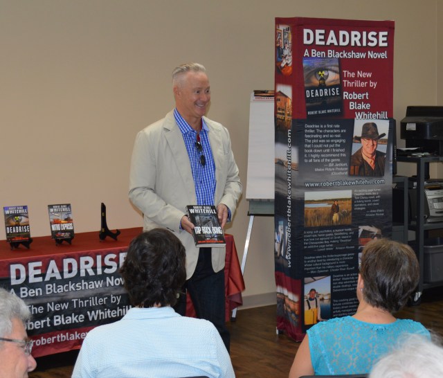 Robert Blake Whitehill speaking with other writers at the Queen Anne's County Library.